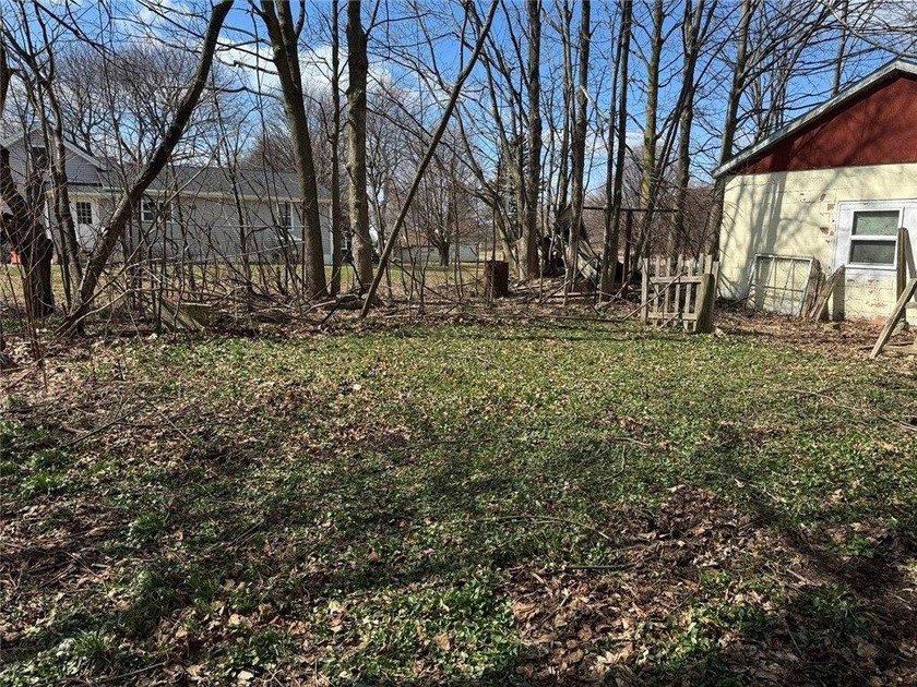 Welcome to this charming ranch-style home in Oswego, NY, ideally - photo 3