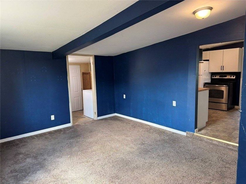 Welcome to this charming ranch-style home in Oswego, NY, ideally - photo 5