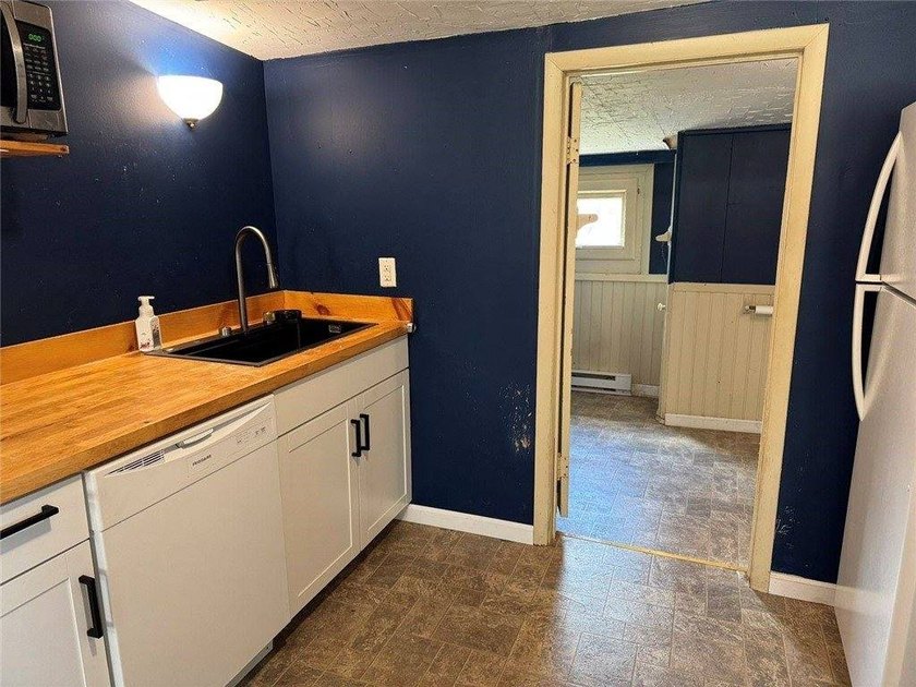 Welcome to this charming ranch-style home in Oswego, NY, ideally - photo 8