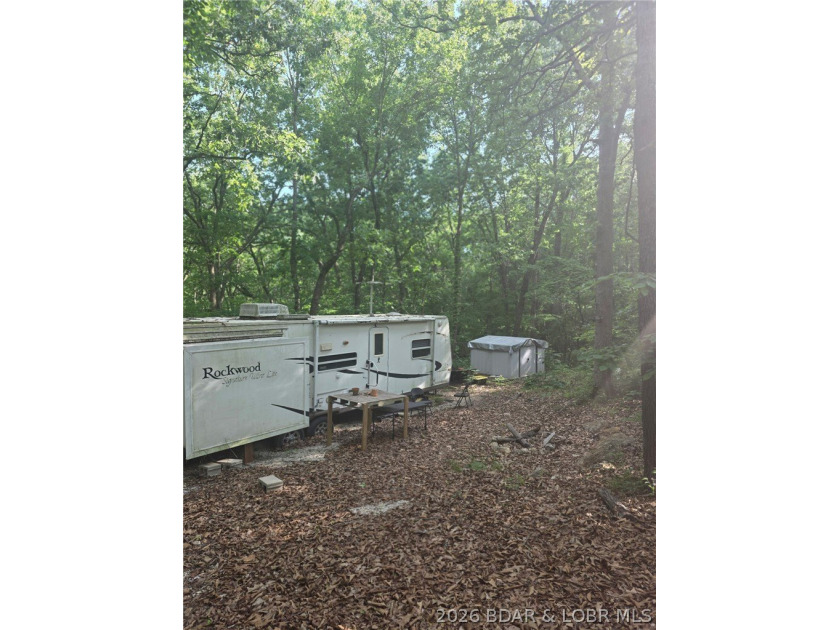Tucked just off the pavement is this 5 acre parcel offering a - photo 3