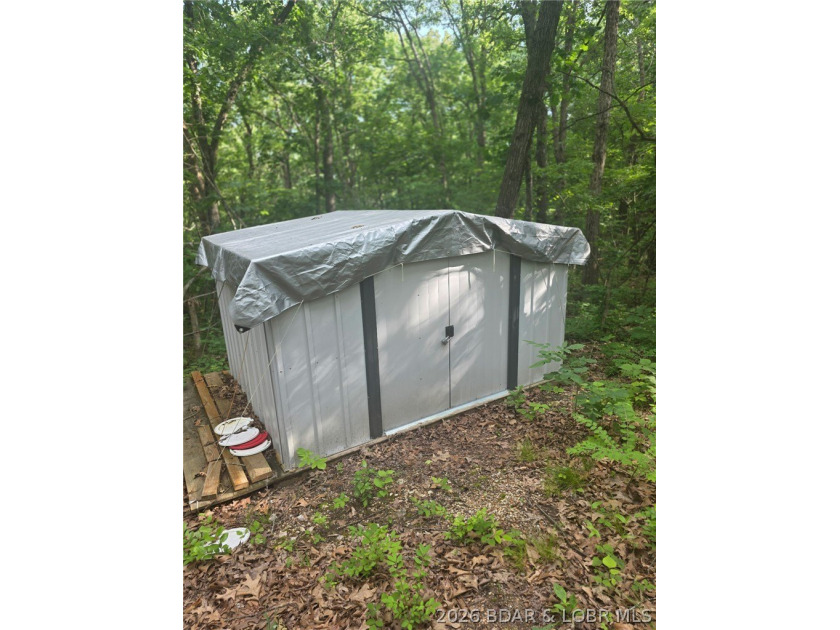 Tucked just off the pavement is this 5 acre parcel offering a - photo 4