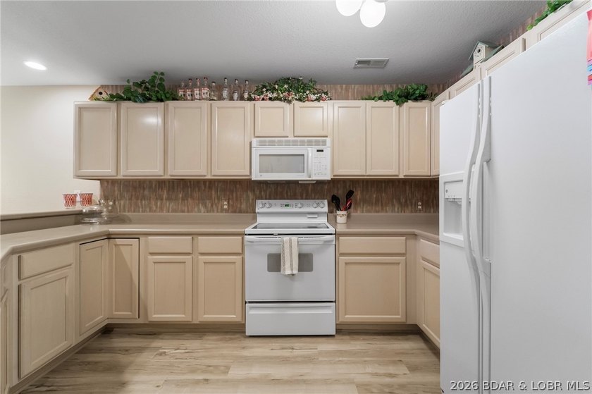 Walk-in level lakefront living in sought-after Bristol Bay! This - photo 8