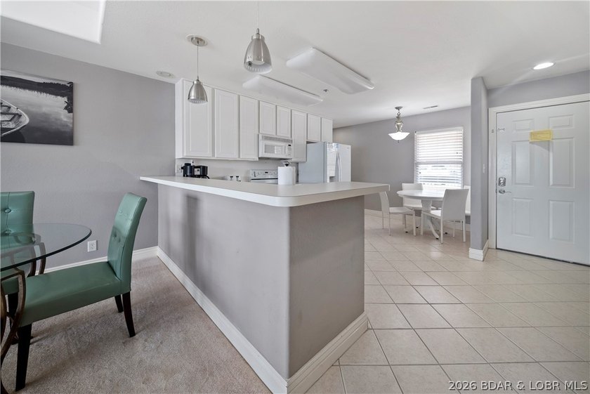 If you've been searching for a Lake Ozark condo with - photo 9