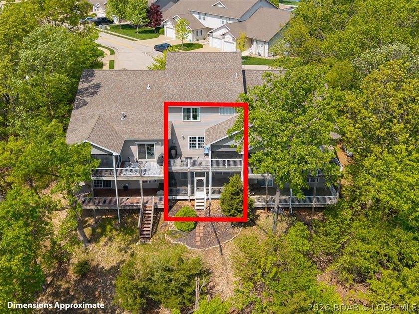 Walk-in, no steps, attached garage, lake views, and very low - photo 4