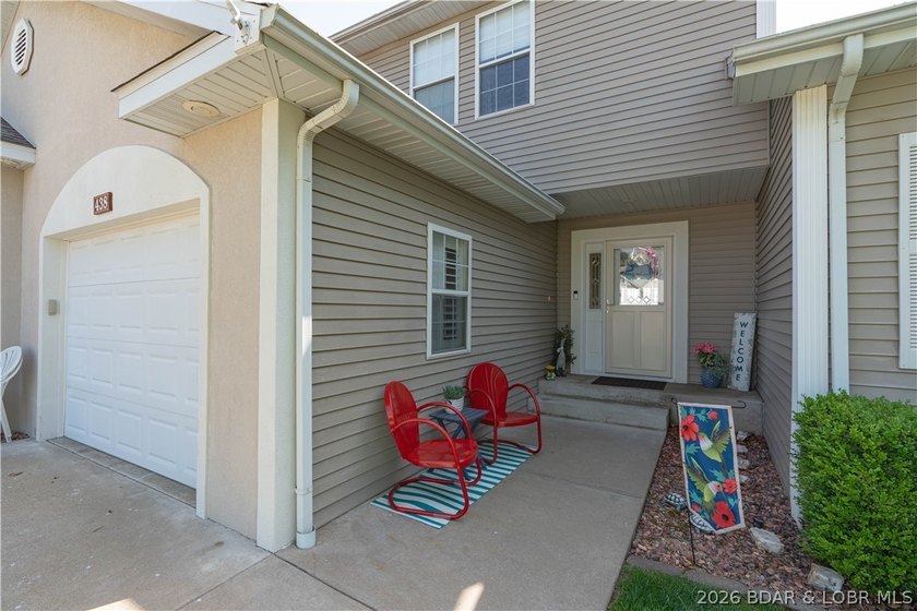 Walk-in, no steps, attached garage, lake views, and very low - photo 6