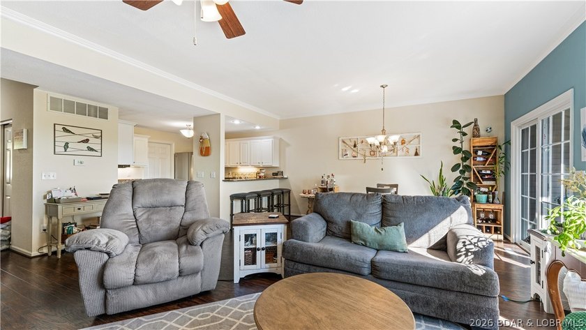 Walk-in, no steps, attached garage, lake views, and very low - photo 7