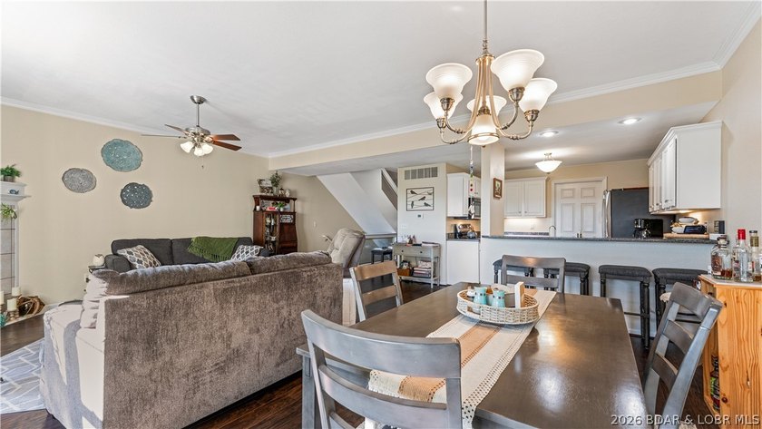 Walk-in, no steps, attached garage, lake views, and very low - photo 9
