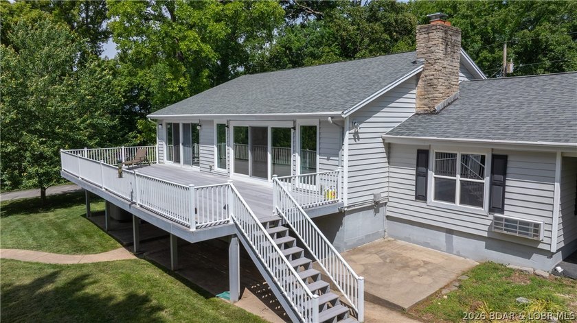 Lakefront living at its finest! This updated 4-bedroom, 3-bath - photo 2