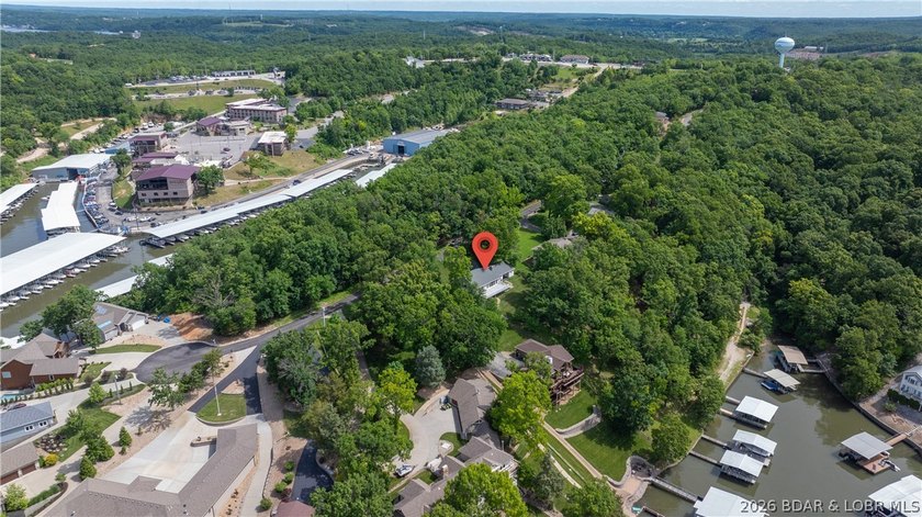 Lakefront living at its finest! This updated 4-bedroom, 3-bath - photo 5