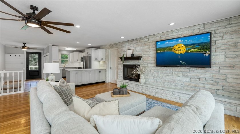 Lakefront living at its finest! This updated 4-bedroom, 3-bath - photo 9