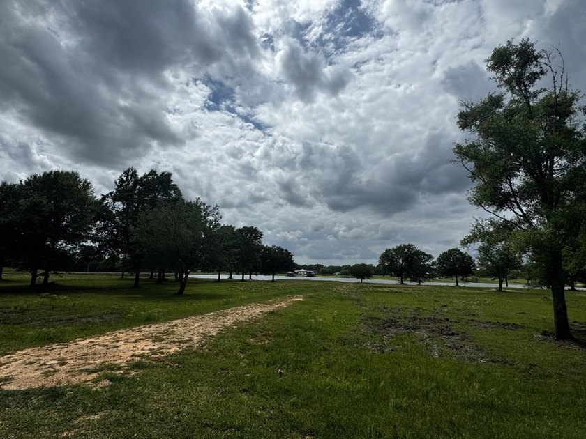 This cleared and remarkable, waterfront 5 acre parcel is ready - photo 3