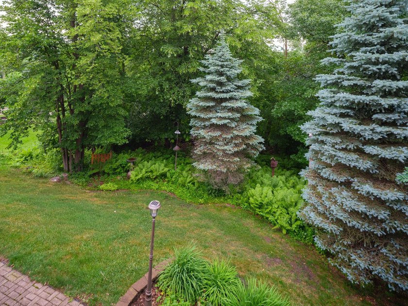 Welcome to this meticulously reimagined ranch nestled in a quiet - photo 3