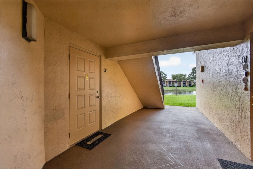 Enjoy peaceful lake views from this condo w/ living/dining room - photo 11
