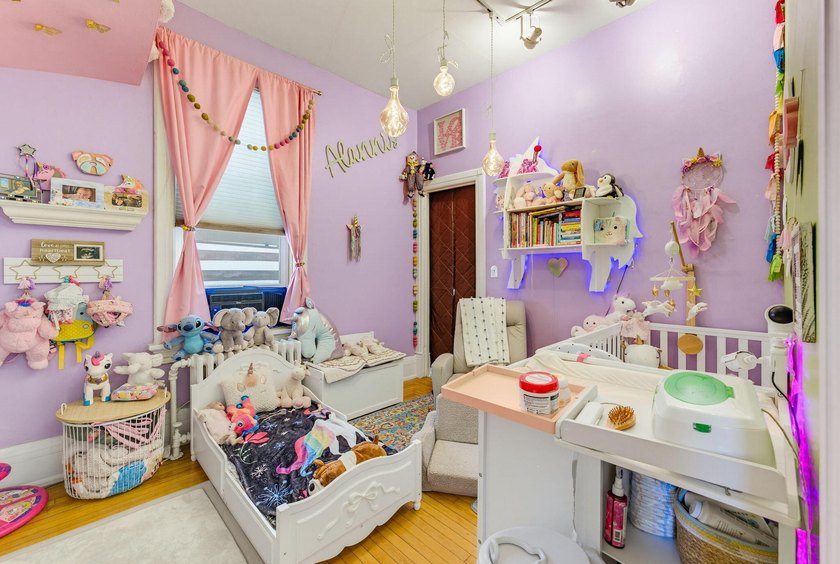 This historic duplex was designed and built in 1893 by the - photo 12