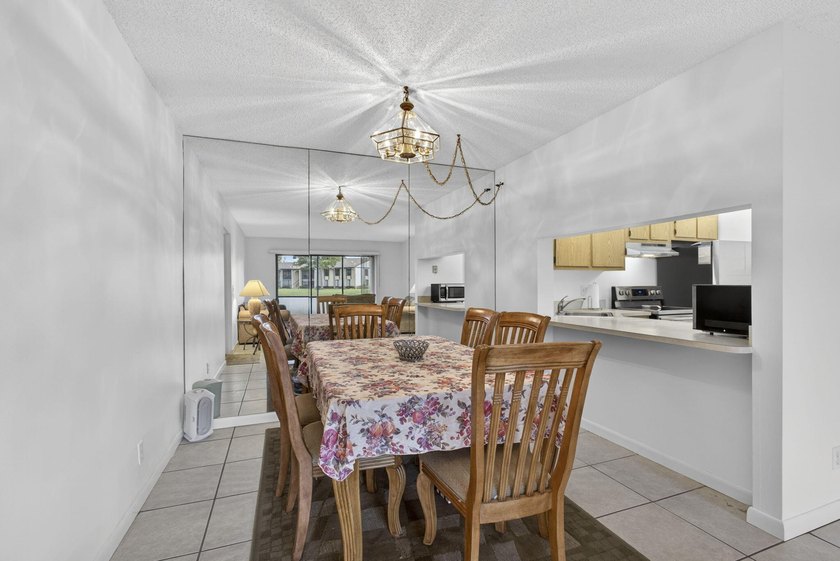 Enjoy peaceful lake views from this condo w/ living/dining room - photo 13