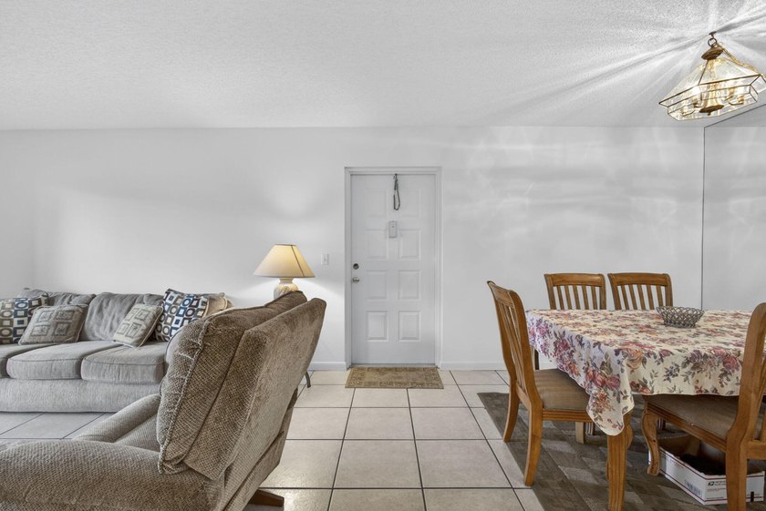 Enjoy peaceful lake views from this condo w/ living/dining room - photo 14