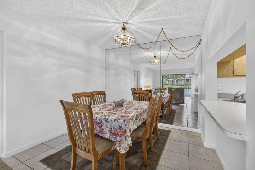 Enjoy peaceful lake views from this condo w/ living/dining room - photo 15