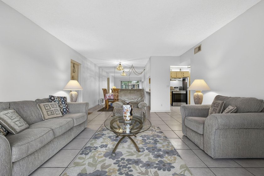 Enjoy peaceful lake views from this condo w/ living/dining room - photo 20