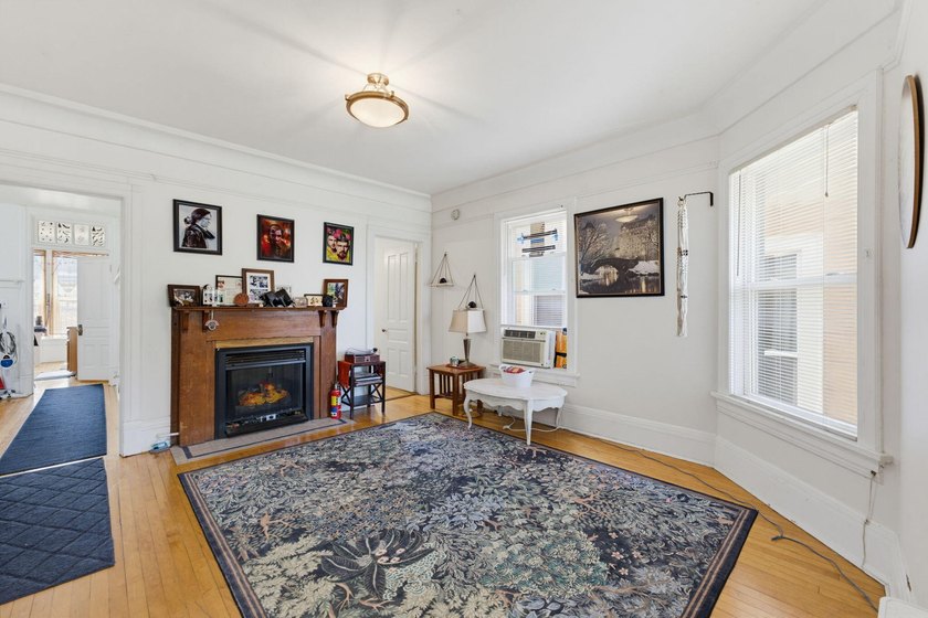 This historic duplex was designed and built in 1893 by the - photo 21