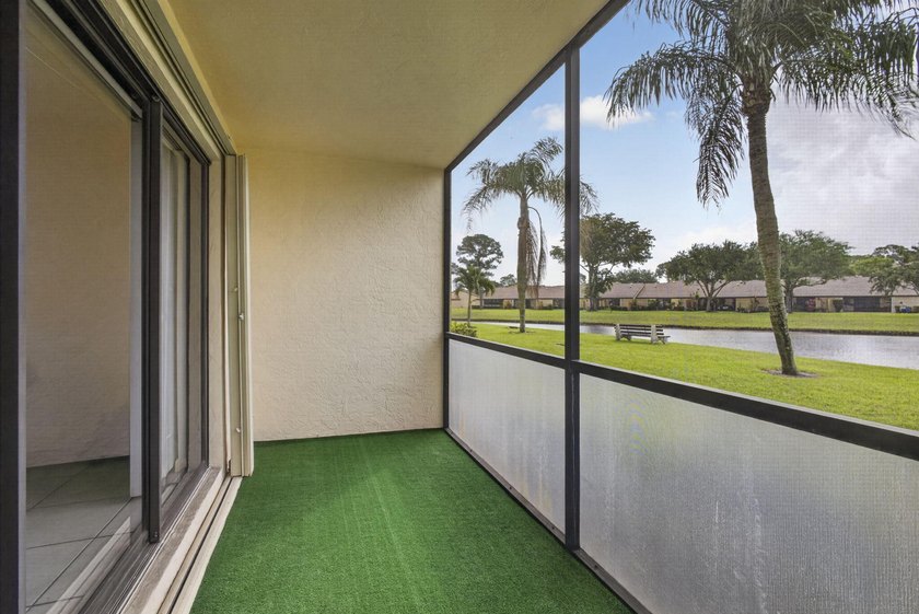 Enjoy peaceful lake views from this condo w/ living/dining room - photo 23