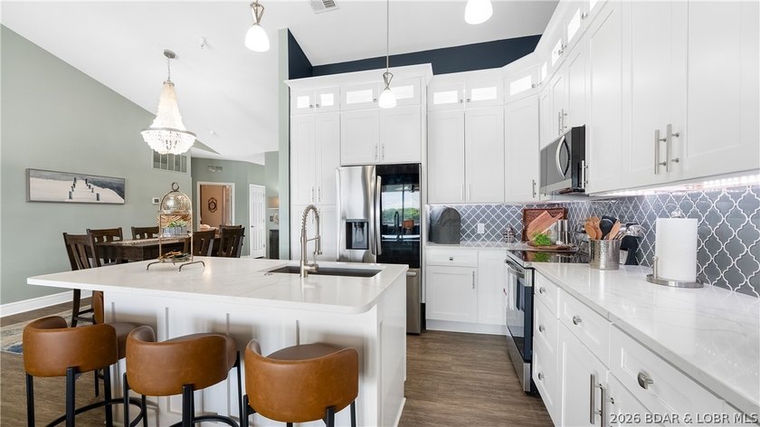 Experience lake living at its finest in this stunning - photo 6