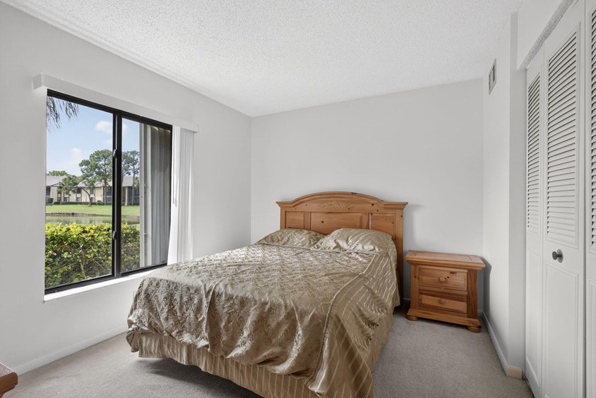 Enjoy peaceful lake views from this condo w/ living/dining room - photo 42