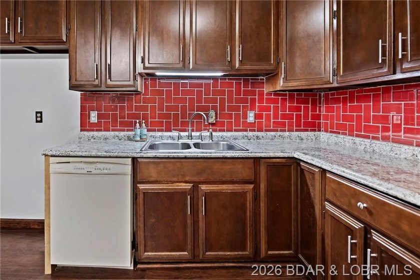 Conveniently located near town on paved road is a nicely done 2 - photo 3