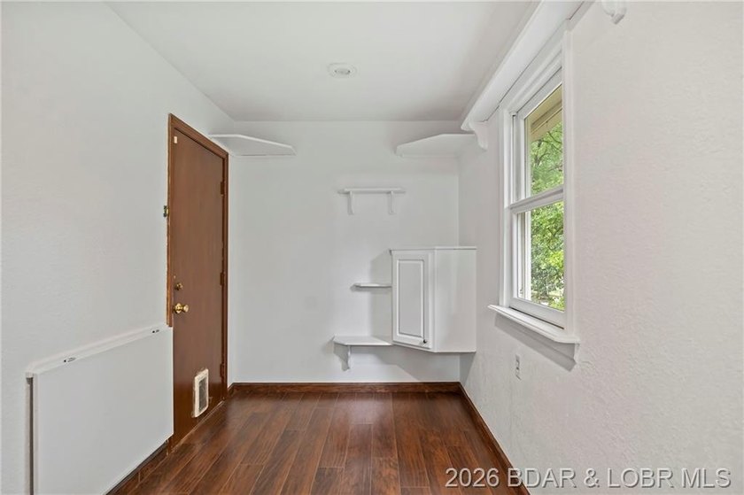 Conveniently located near town on paved road is a nicely done 2 - photo 6