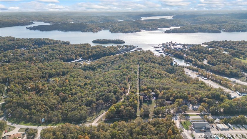 Spanning 54 acres with approximately 2,800 feet of prime lake - photo 4