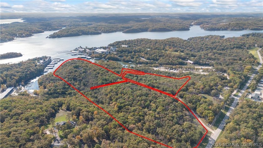 Spanning 54 acres with approximately 2,800 feet of prime lake - photo 5