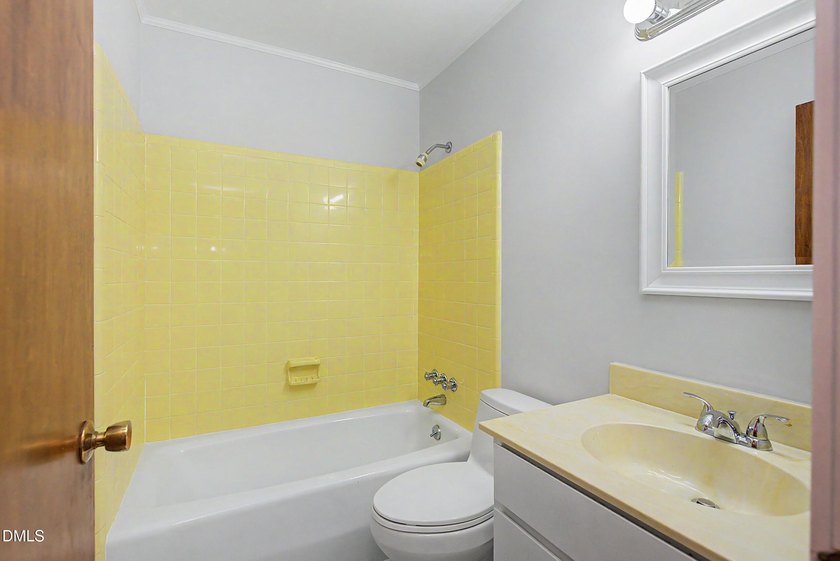 Tucked away on a sprawling corner lot of over 1/2 an acre in the - photo 11