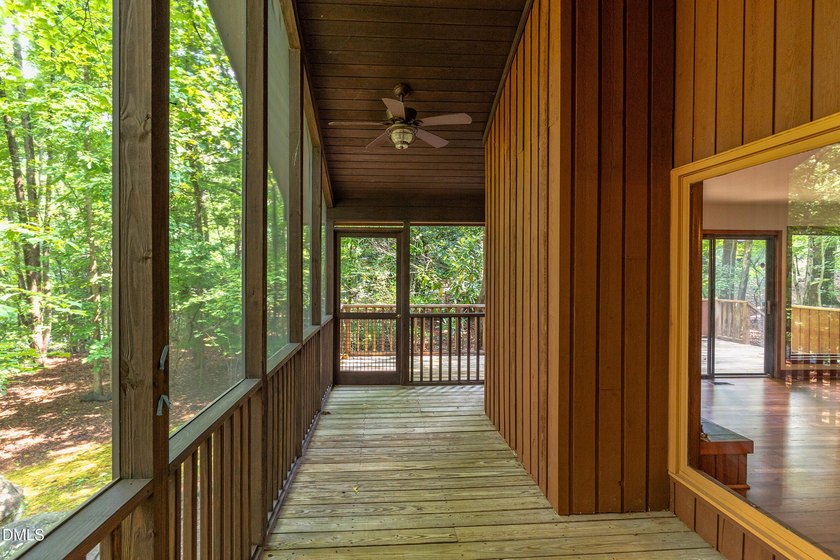 Tucked away on a sprawling corner lot of over 1/2 an acre in the - photo 17