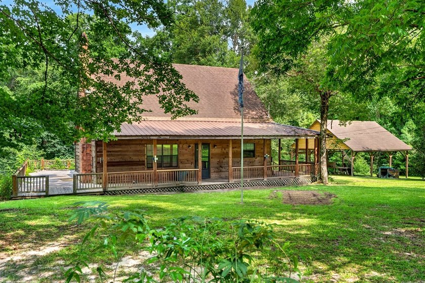 Don't miss this log cabin full of Rustic charm located in - photo 3