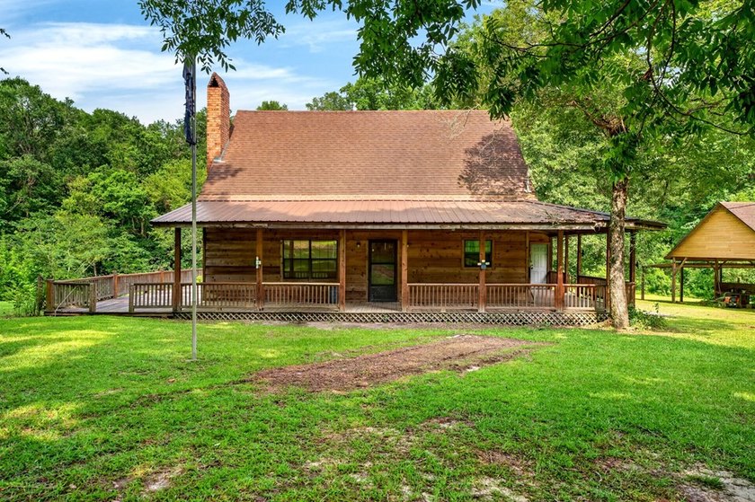 Don't miss this log cabin full of Rustic charm located in - photo 4