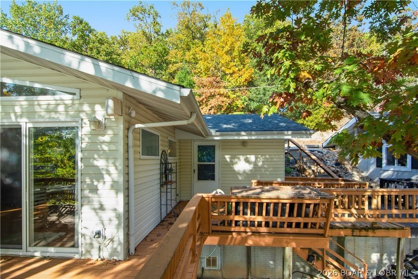 Looking for a 2-bedroom home in Lake Ozark sitting directly on - photo 9