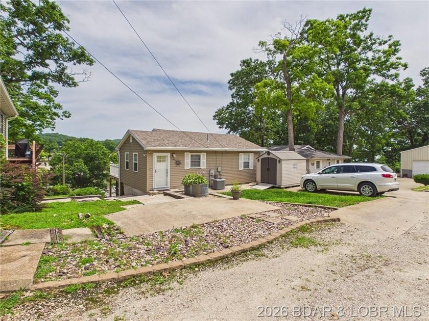 Enjoy lake living in this beautifully updated second-tier home - photo 2