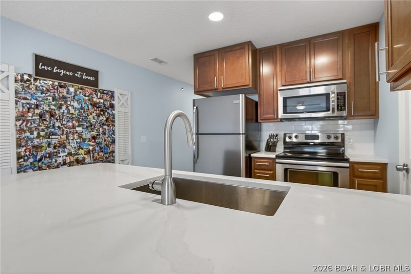 Beautifully renovated 3-bedroom, 2-bath lakefront condo at the - photo 3