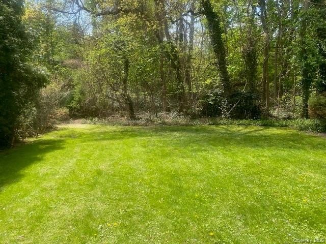 Roslyn, Flower Hill 5 Bedroom, 3 Bath Sprawling Ranch on - photo 7