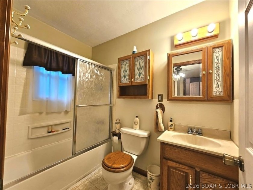 This 2-bedroom, 2-bath home offers lake access and is situated - photo 8
