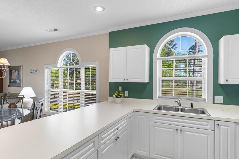 Tucked inside the sought-after Magnolia Place community, this - photo 11