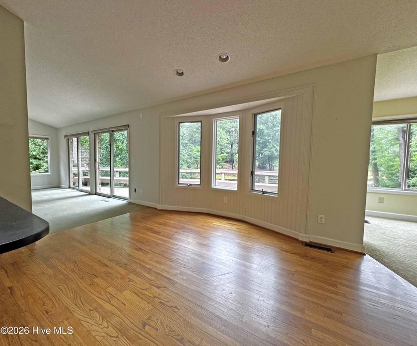 Enjoy peaceful waterfront living in this full-brick, 3-bedroom - photo 12