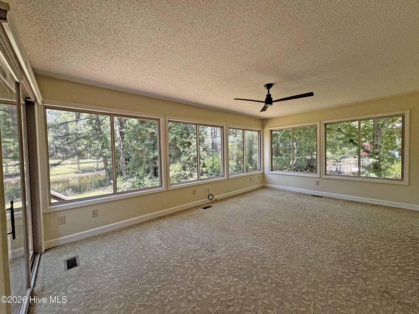 Enjoy peaceful waterfront living in this full-brick, 3-bedroom - photo 14