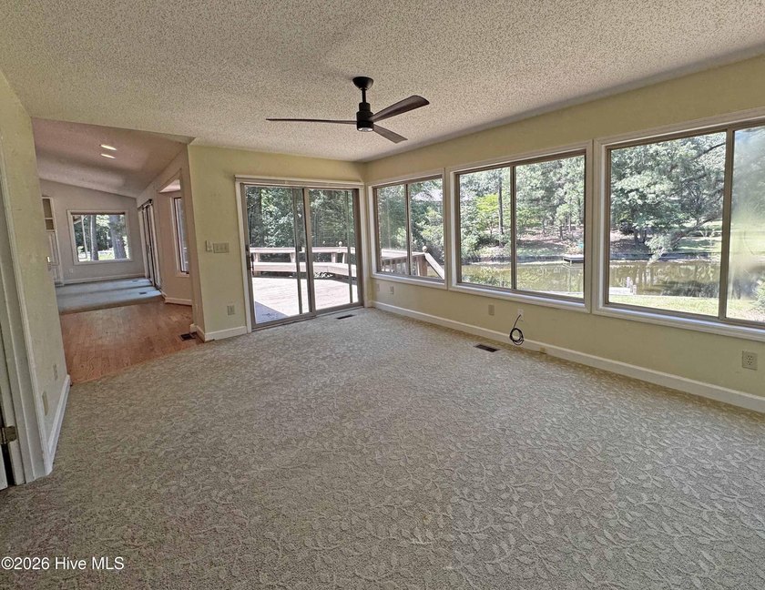 Enjoy peaceful waterfront living in this full-brick, 3-bedroom - photo 15