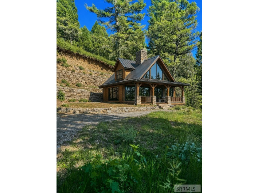 Perched high above Henry's Lake, this remarkable 13.44-acre - photo 3