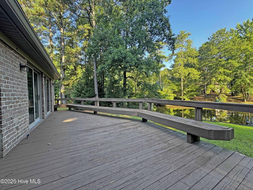 Enjoy peaceful waterfront living in this full-brick, 3-bedroom - photo 27