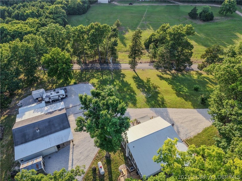 New price on this Lake area retreat on 3 acres with garage/RV - photo 5