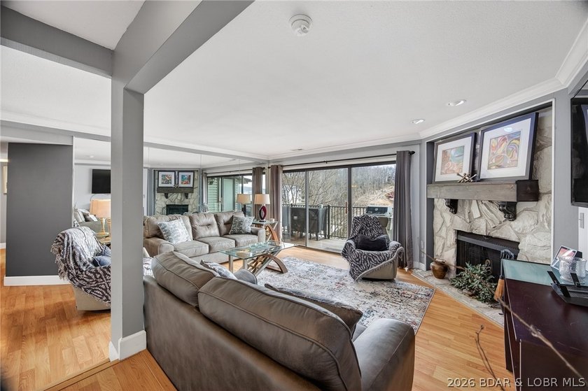 MOTIVATED SELLER! Top-floor views and lake life at its best - photo 2