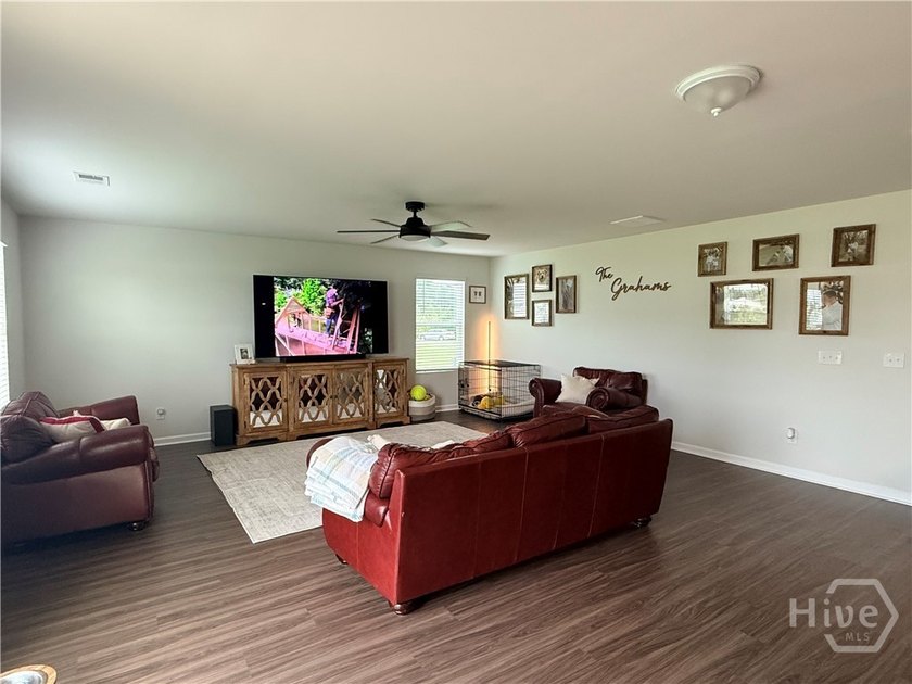 Positioned on a pond-view lot, this move-in ready 2023-built - photo 22