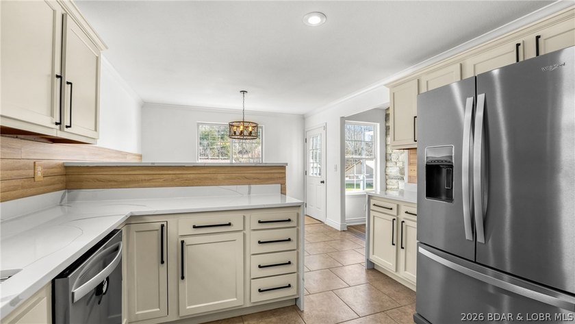Experience lake living at its best in this beautifully updated - photo 5
