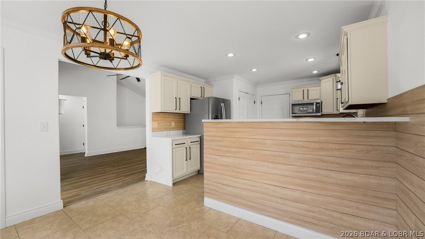 Experience lake living at its best in this beautifully updated - photo 6